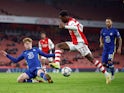 Arsenal U21's Khayon Edwards in action with Chelsea U21's Brodi Hughes in January 2022