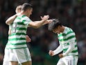 Celtic's Reo Hatate celebrates scoring their first goal with teammates on April 9, 2022