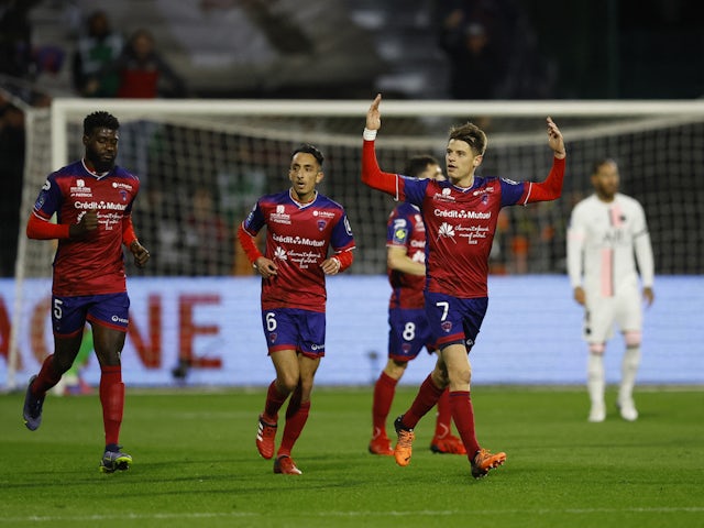 Clermont's Yohann Magnin celebrates their first goal scored by Jodel Dossou on April 9, 2022