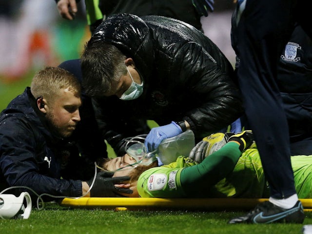 Blackpool's Daniel Grimshaw receives medical attention on April 5, 2022