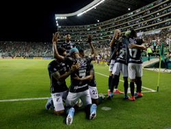 Deportivo Cali's Jhon Vasquez celebrates scoring their second goal with teammates on April 6, 2022