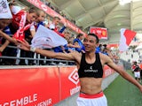 Hugo Ekitike celebrates with fans after the match on September 26, 2021