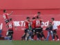 Mallorca's Vedat Muriqi celebrates scoring their first goal with teammates on April 9, 2022