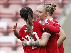 Manchester United Women's Leah Galton celebrates scoring their first goal with Katie Zelem on April 3, 2022