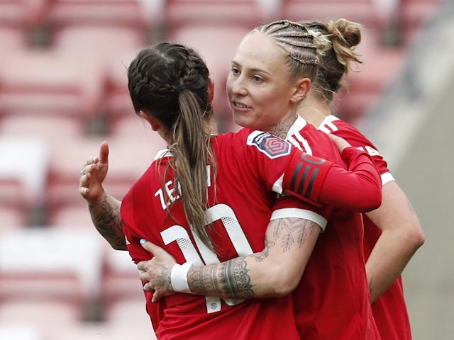 Manchester United Women's Leah Galton celebrates scoring their first goal with Katie Zelem on April 3, 2022
