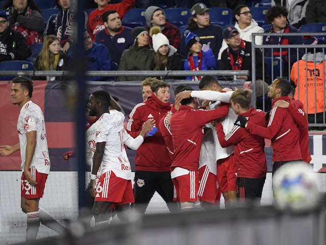 The New York Red Bulls celebrate after a New England Revolution own goal during the second half at Gillette Stadium on April 3, 2022