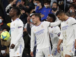 Real Madrid's Casemiro celebrates scoring their first goal with Eduardo Camavinga, Lucas Vazquez and Vinicius Junior on April 9, 2022