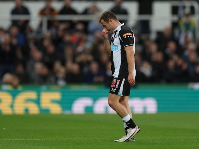 Newcastle United's Ryan Fraser walks off the pitch dejected after sustaining an injury on April 8, 2022