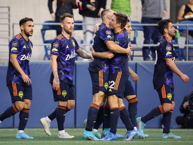 Seattle Sounders forward Jordan Morris (13) celebrates with teammates after scoring a goal during the first half of the Concacaf Champions League semifinal match against the New York City FC at Lumen field on April 6, 2022