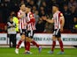 Sheffield United's Oliver Norwood celebrates scoring their first goal with with teammates on April 5, 2022