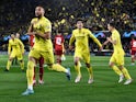 Villarreal's Arnaut Danjuma celebrates scoring their first goal with teammates on April 6, 2022