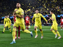 Villarreal's Arnaut Danjuma celebrates scoring their first goal with teammates on April 6, 2022