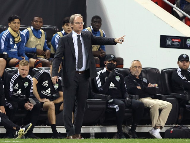 Seattle Sounders head coach Brian Schmetzer (front) gestures from the sideline during the first half against the New York City FC at Red Bull Arena on April 12, 2022