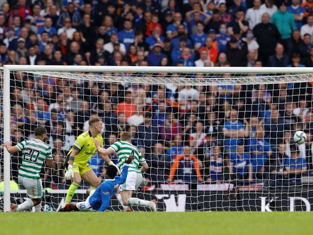 Celtic's Carl Starfelt scores an own goal against Rangers on April 17, 2022 