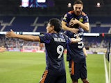 Seattle Sounders forward Raul Ruidiaz (9) celebrates with teammates after scoring a goal during the first half against the New York City FC at Red Bull Arena on April 13, 2022
