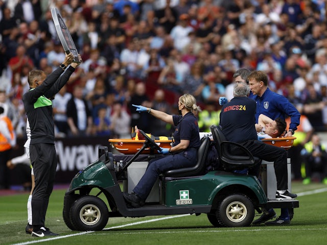 Burnley's Ashley Westwood is stretchered off after after sustaining an injury on April 17, 2022