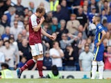 West Ham United's Craig Dawson exits the pitch after being shown a red card on April 24, 2022