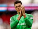 Burnley's Nick Pope applauds the fans after the match on April 17, 2022