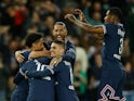 Paris Saint-Germain's Lionel Messi celebrates scoring against Lens with teammates on April 23, 2022