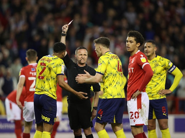 West Bromwich Albion's Darnell Furlong is shown a red card by referee David Webb on April 18, 2022