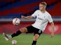 Amos Pieper warms up for Germany's Olympic squad in July 2021