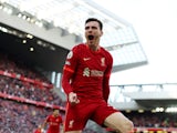 Andy Robertson celebrates scoring for Liverpool in April 2022