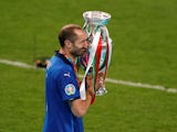 Italy's Giorgio Chiellini celebrates with the Euro 2020 trophy on July 11, 2021