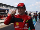 Charles Leclerc celebrates taking pole on May 7, 2022