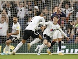 Kenny Tete and Harry Wilson celebrate a Fulham goal against Luton Town on May 2, 2022.