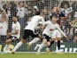 Kenny Tete and Harry Wilson celebrate a Fulham goal against Luton Town on May 2, 2022.