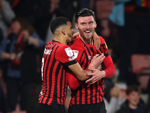 Kieffer Moore celebrates scoring the goal which earned Bournemouth promotion to the Premier League on May 3, 2022.