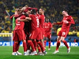 Liverpool players celebrate Fabinho's goal against Villarreal in the Champions League on May 3, 2022