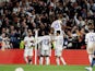 Real Madrid's Karim Benzema celebrates scoring their third goal with their fans and teammates on May 4, 2022
