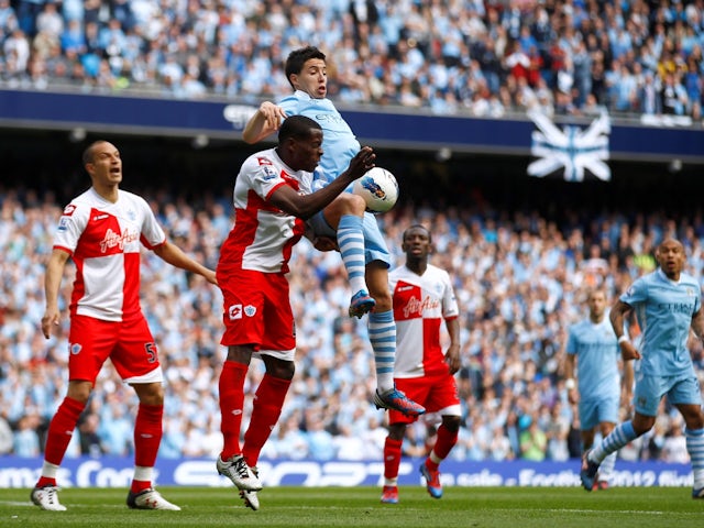 Manchester City's Samir Nasri in action against Queens Park Rangers' Nedum Onuoha on May 13, 2012
