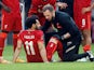 Mohamed Salah goes down injured for Liverpool on May 14, 2022
