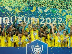 Nantes' Ludovic Blas lifts the trophy with teammates after winning the French Cup May 7, 2022