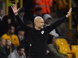 Manchester City manager Pep Guardiola celebrates their fifth goal on May 11, 2022