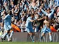 Manchester City's Sergio Aguero celebrates scoring the winning goal against Queens Park Rangers on May 13, 2012