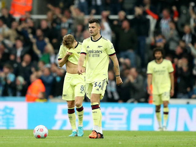 Arsenal players look dejected on May 16, 2022