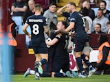 Burnley's Ashley Barnes celebrates scoring their first goal with teammates on May 19, 2022