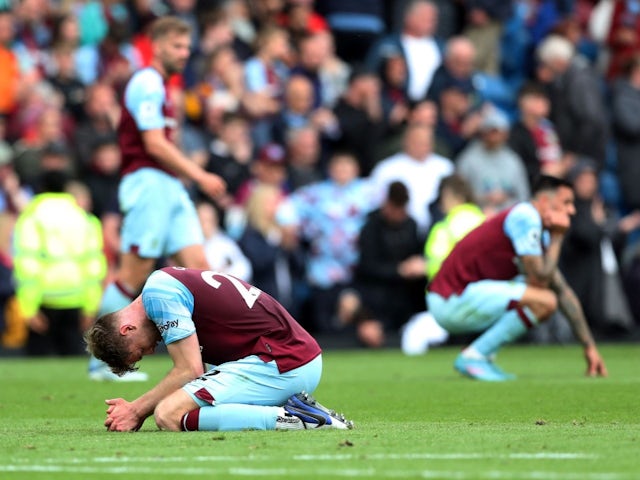 Burnley's Nathan Collins looks dejected after losing the match and being relegated from the Premier League on May 22, 2022