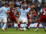 Manchester City's Darius Vassell in action with Aston Villa's Gareth Barry and Martin Laursen on September 16, 2007
