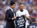 Paris Saint-Germain president Nasser Al-Khelaifi pictured with Kylian Mbappe on May 21, 2022
