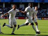 Nedum Onuoha celebrates with Lee Cattermole and Mark Noble after scoring for England Under-21s on June 26, 2009