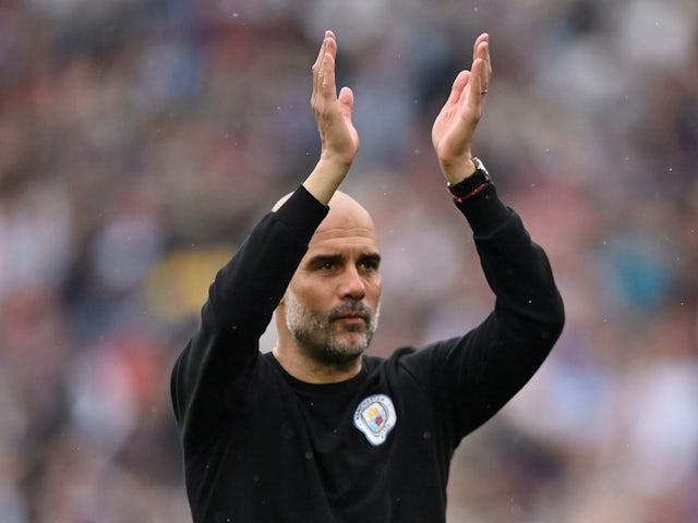 Manchester City manager Pep Guardiola applauds the fans after the match on May 15, 2022