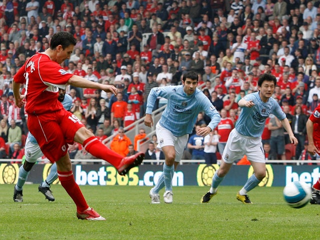 Middlesbrough's Stewart Downing scores against Manchester City on May 11, 2008