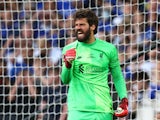 Liverpool's Alisson celebrates after Chelsea's Cesar Azpilicueta misses a penalty during the shoot-out in May 2022