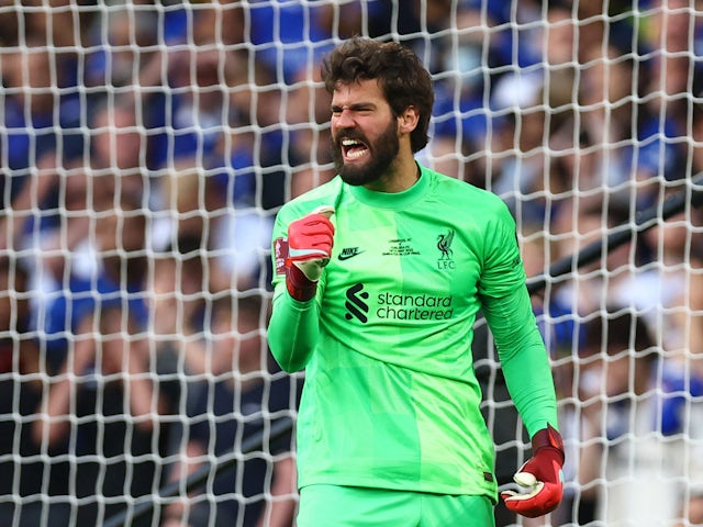 Liverpool's Alisson celebrates after Chelsea's Cesar Azpilicueta misses a penalty during penalty shootout in May 2022
