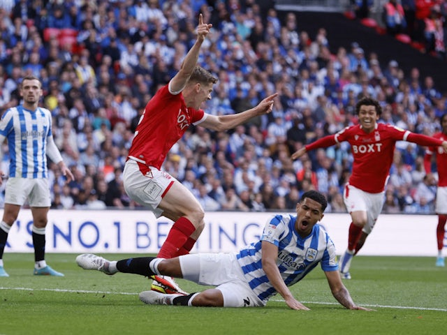 Nottingham Forest celebrate Huddersfield Town defender Levi Colwill's own goal in the Championship playoff final on May 29, 2022.