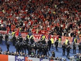 General view of Liverpool fans in the stands as police officers and stewards are seen on May 28, 2022